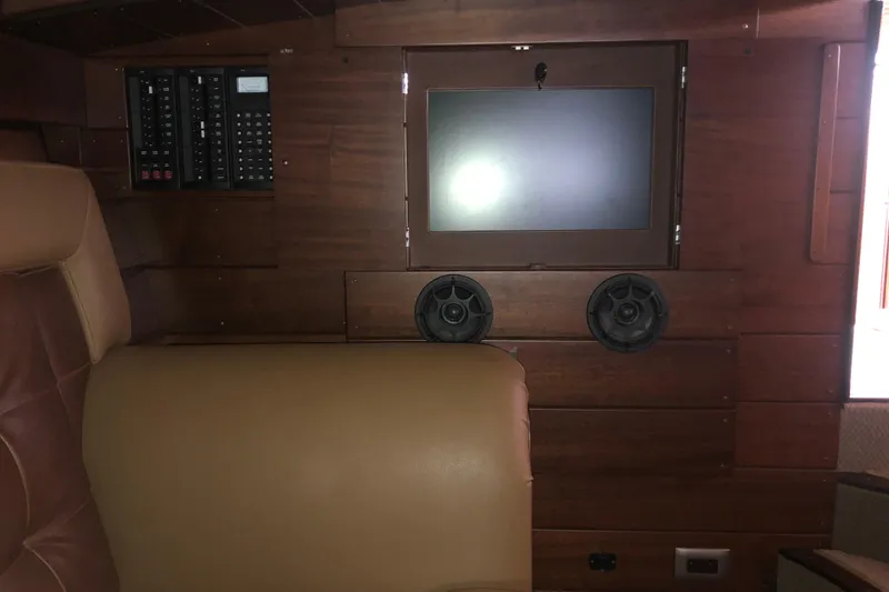 Slide: The Image of Interior of 2013 StanCraft 360 Rivelle with wood paneling, screen, and speakers. - 14