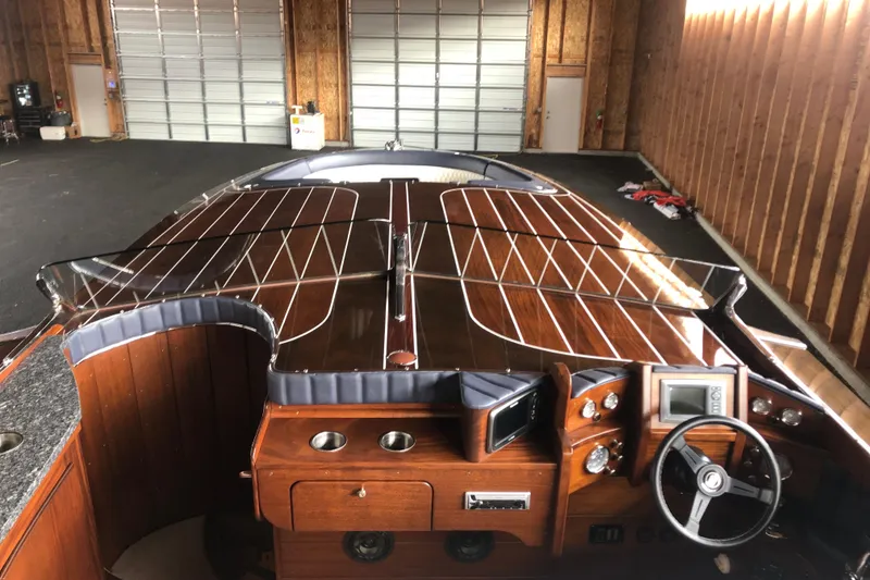 Slide: The Image of Luxurious 2013 StanCraft 360 Rivelle boat with polished wood interior and modern dashboard. - 27