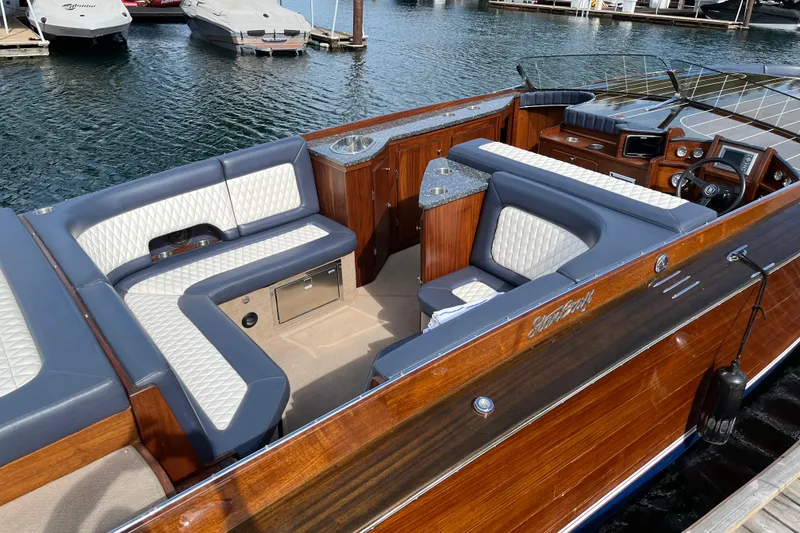 Slide: The Image of Luxurious 2013 StanCraft 360 Rivelle boat interior with elegant seating and wood finish. - 4