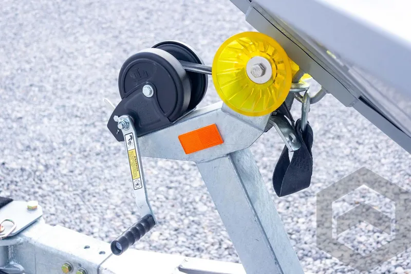 Slide: The Image of Trailer winch with yellow roller on G3 Bay 19 GX, 2026 model. - 10
