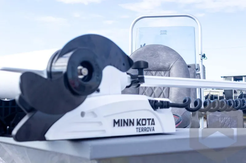 Slide: The Image of Minn Kota Terrova motor on 2026 G3 Bay 19 GX boat, featuring a cushioned seat. - 12