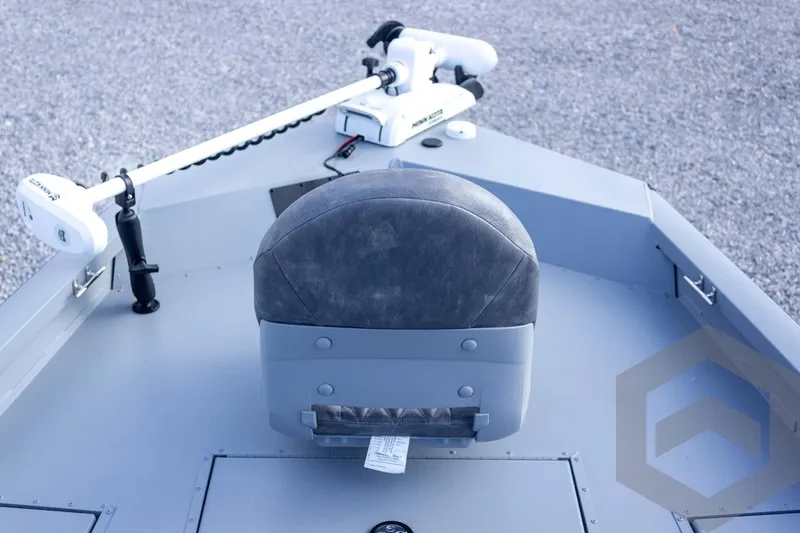 Slide: The Image of 2026 G3 Bay 19 GX boat interior with seat and trolling motor. - 20