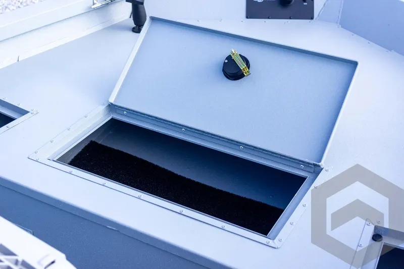 Slide: The Image of Open storage compartment on 2026 G3 Bay 19 GX boat deck. - 26