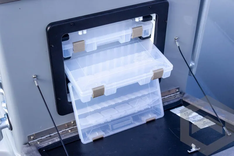 Slide: The Image of Storage compartment with clear plastic drawers in a 2026 G3 Bay 19 GX. - 32