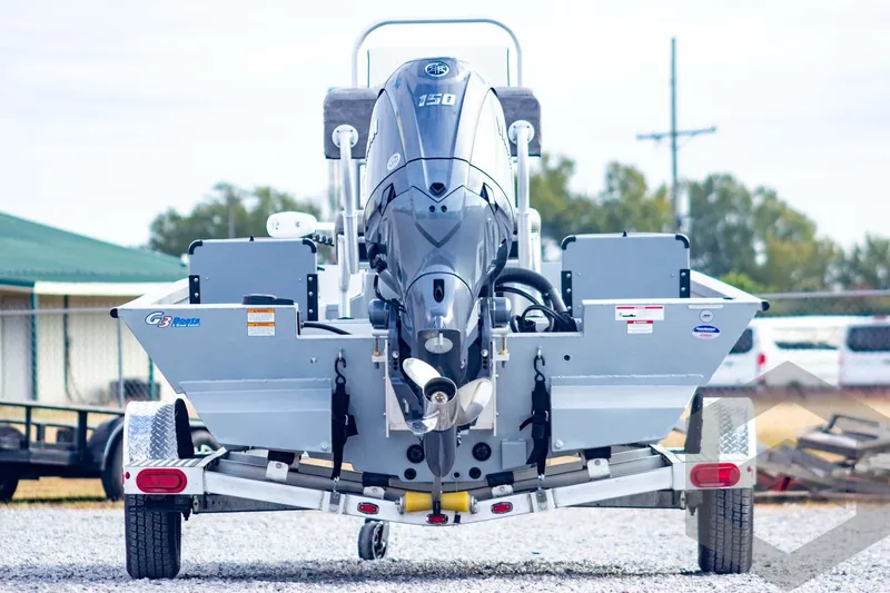 Slide: The Image of 2026 G3 Bay 19 GX boat on trailer, rear view with powerful outboard motor. - 4