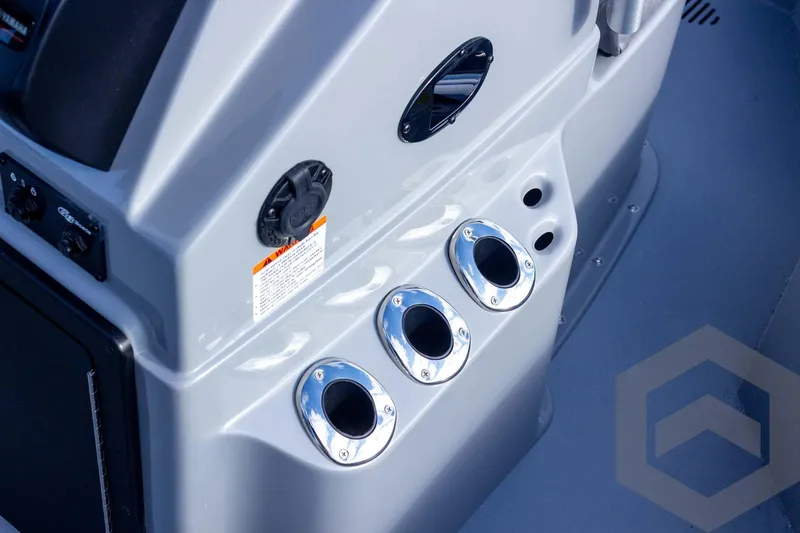 Slide: The Image of Control panel of 2026 G3 Bay 19 GX boat with cup holders. - 40