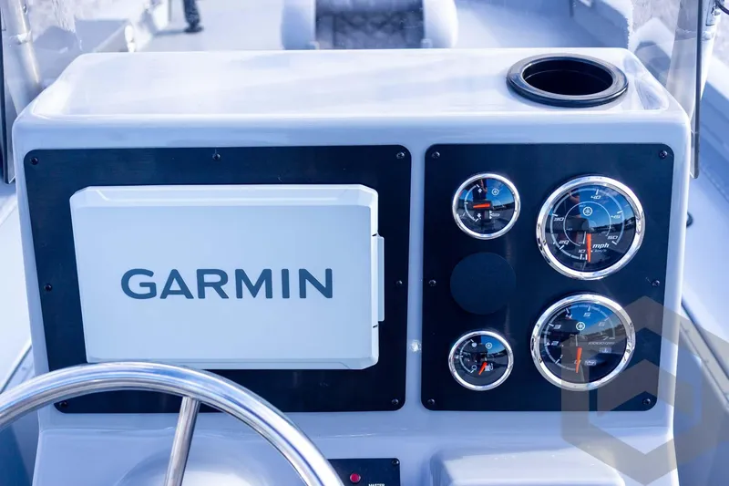 Slide: The Image of Dashboard of 2026 G3 Bay 19 GX boat with Garmin navigation system and gauges. - 43