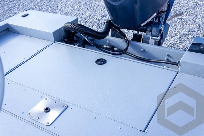 Slide: The Image of 2026 G3 Bay 19 GX boat deck with motor and cables, featuring a sleek design. - 49