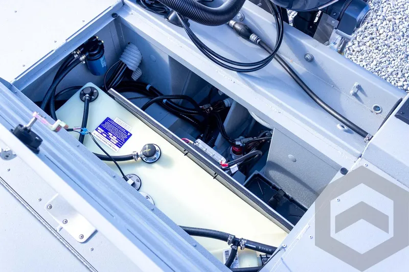 Slide: The Image of Open engine compartment of 2026 G3 Bay 19 GX boat, showing internal components and wiring. - 50