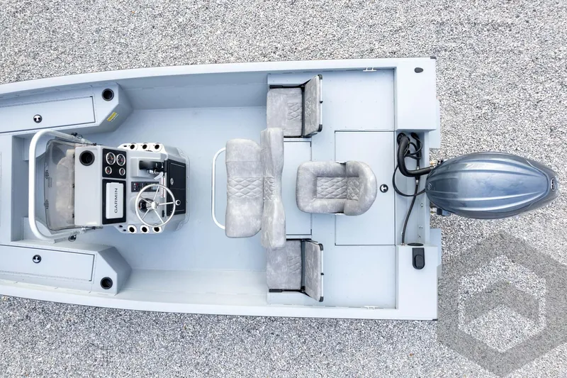 Slide: The Image of Overhead view of 2026 G3 Bay 19 GX boat with seating and control console. - 56