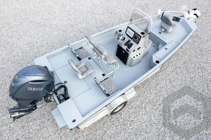 Slide: The Image of 2026 G3 Bay 19 GX fishing boat with Yamaha motor, featuring spacious deck and modern controls. - 61