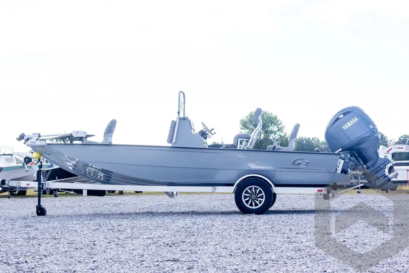 Slide: The Image of 2026 G3 Bay 19 GX boat with Yamaha motor on gravel lot. - 9