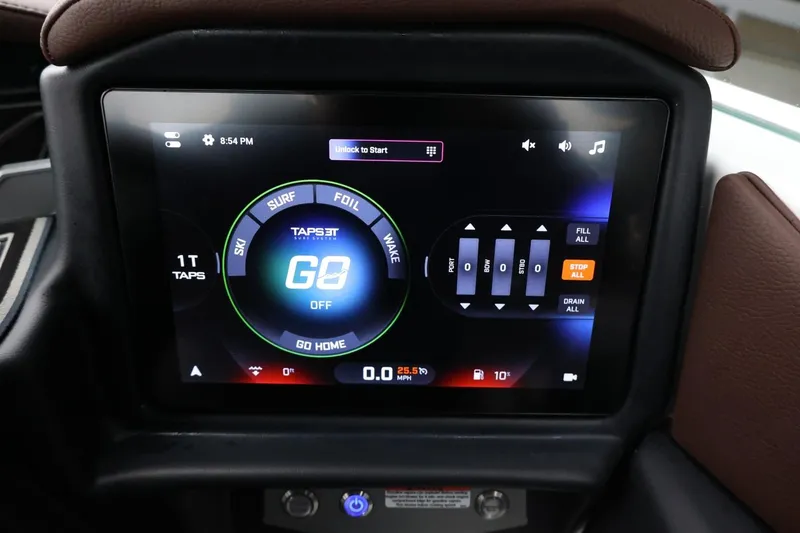 Slide: The Image of 2026 Tigé Z3 touchscreen display showing TAPS 3T control system interface. - 32