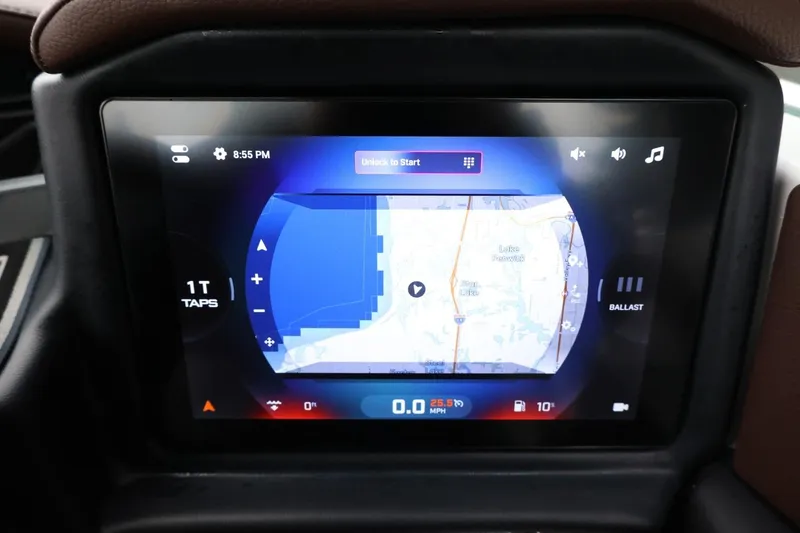 Slide: The Image of 2026 Tigé Z3 dashboard display showing navigation and control settings. - 33