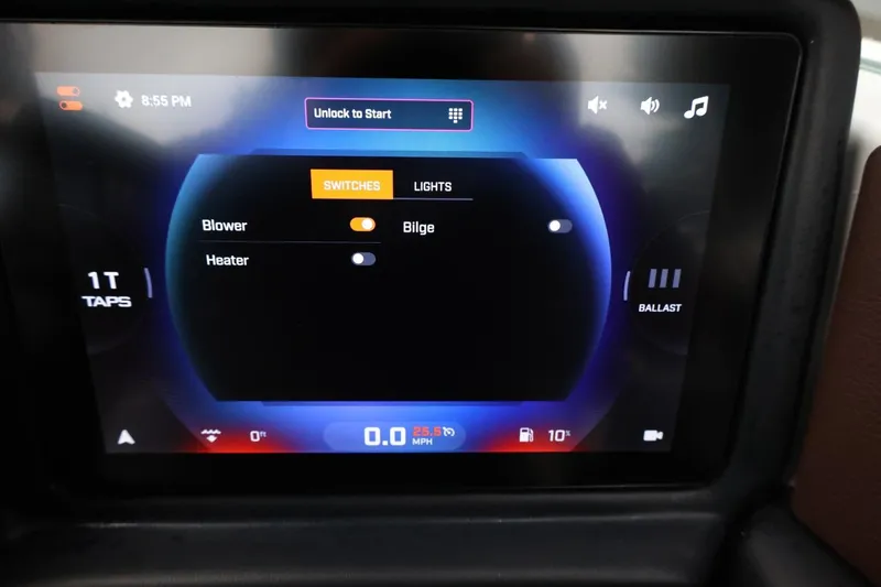 Slide: The Image of Touchscreen display of 2026 Tigé Z3 boat showing switches and controls. - 34