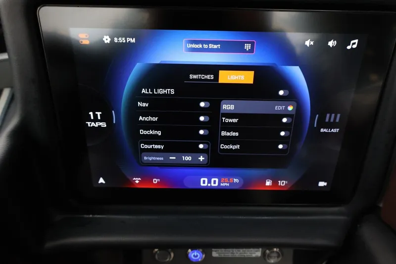 Slide: The Image of Touchscreen control panel in a 2026 Tigé Z3 boat, displaying lighting and ballast settings. - 35