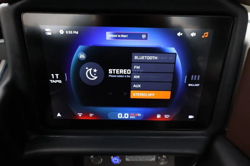 Slide: The Image of Touchscreen display in 2026 Tigé Z3 boat showing stereo and connectivity options. - 36