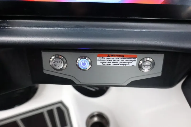 Slide: The Image of 2026 Tigé Z3 dashboard with start/stop button and warning label. - 37