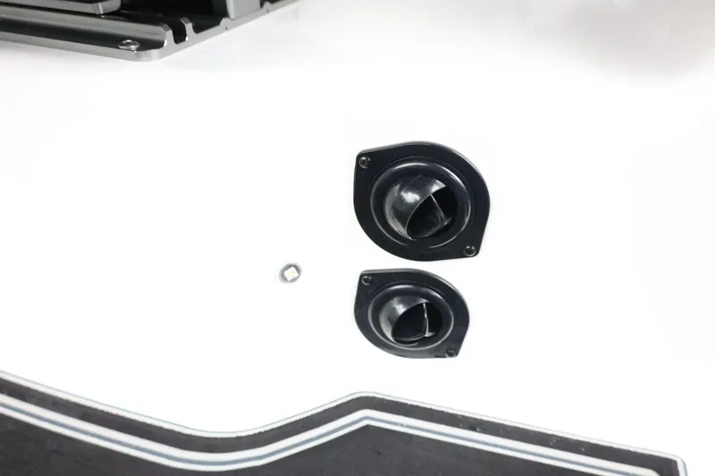Slide: The Image of 2026 Tigé Z3 boat exhaust ports on a sleek white surface. - 40