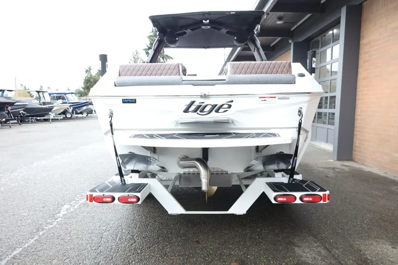 Slide: The Image of 2026 Tigé Z3 boat rear view, showcasing sleek design and advanced features. - 7
