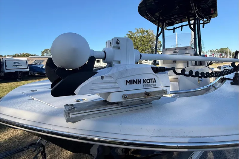 Slide: The Image of 2021 Carolina Skiff 26 Ultra Elite with Minn Kota Terrova trolling motor on deck. - 13