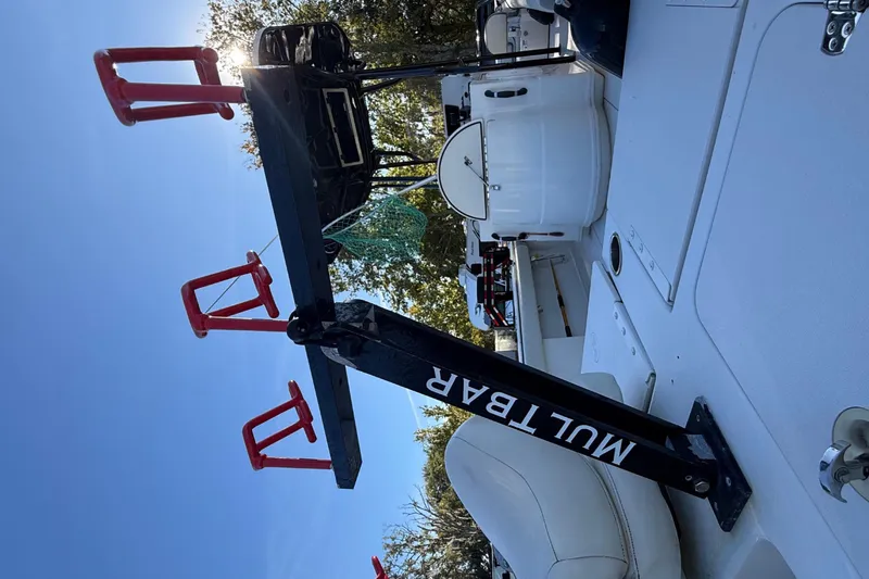 Slide: The Image of 2021 Carolina Skiff 26 Ultra Elite boat deck with fishing rod holders. - 17