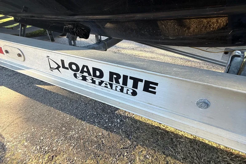 Slide: The Image of Load Rite 5 Star trailer with 2021 Carolina Skiff 26 Ultra Elite boat. - 21