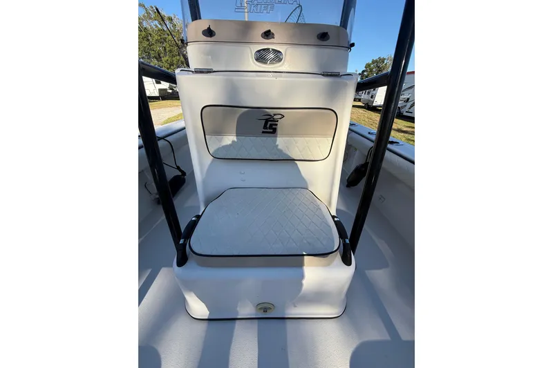 Slide: The Image of 2021 Carolina Skiff 26 Ultra Elite boat seating area with cushioned backrest. - 29