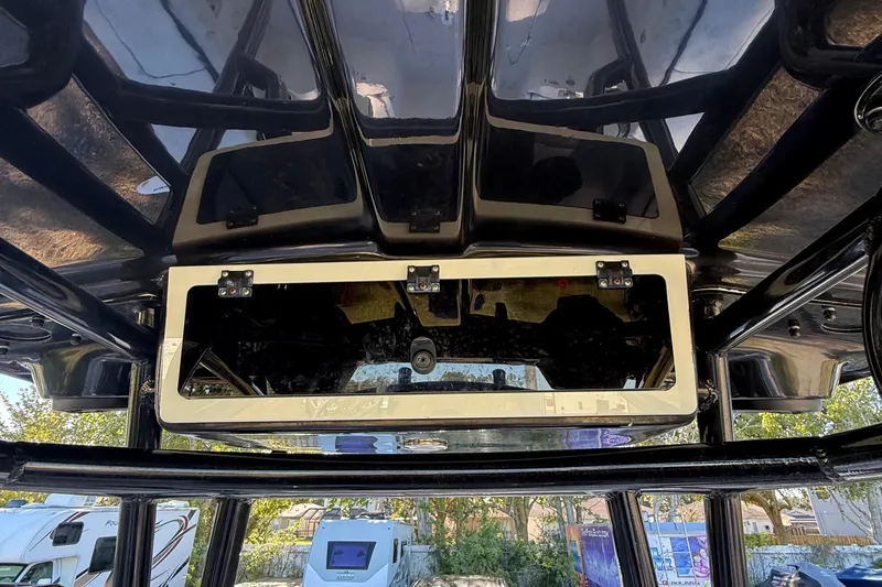 Slide: The Image of 2021 Carolina Skiff 26 Ultra Elite boat console with storage compartment and sleek design. - 40