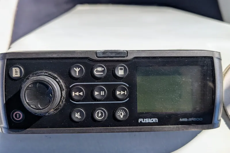 Slide: The Image of Fusion MS-IP600 marine stereo on a 1989 Duffy 20 boat dashboard. - 9