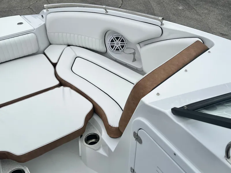 Slide: The Image of Interior of 2026 Stingray 211DC with white and brown upholstery. - 17