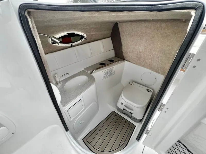 Slide: The Image of Interior view of Stingray 211DC boat toilet, 2026 model. - 24