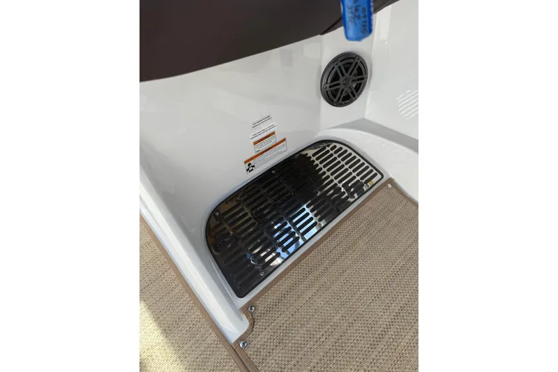 Slide: The Image of 2020 Cobalt 25SC boat interior with speaker and vent detail. - 23