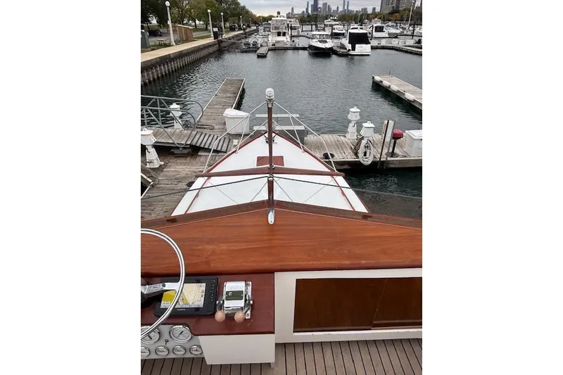 Slide: The Image of 1964 Pacemaker 36 Sportfisherman dashboard with gauges on wooden panel. - 13