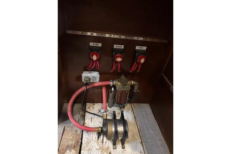 Slide: The Image of 1964 Pacemaker 36 Sportfisherman boat docked in a marina under cloudy skies. - 9