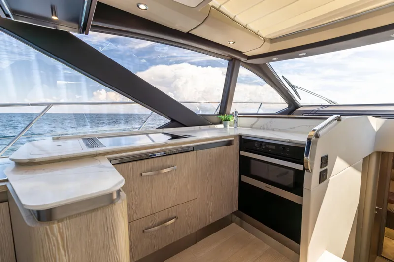 Slide: The Image of Luxurious 2021 Azimut S6 Sportfly yacht kitchen with ocean view and modern appliances. - 108