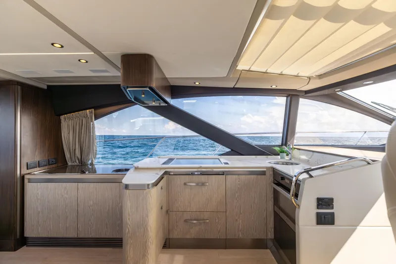 Slide: The Image of Luxurious Azimut S6 Sportfly 2021 yacht interior with marble sink and ocean view. - 113