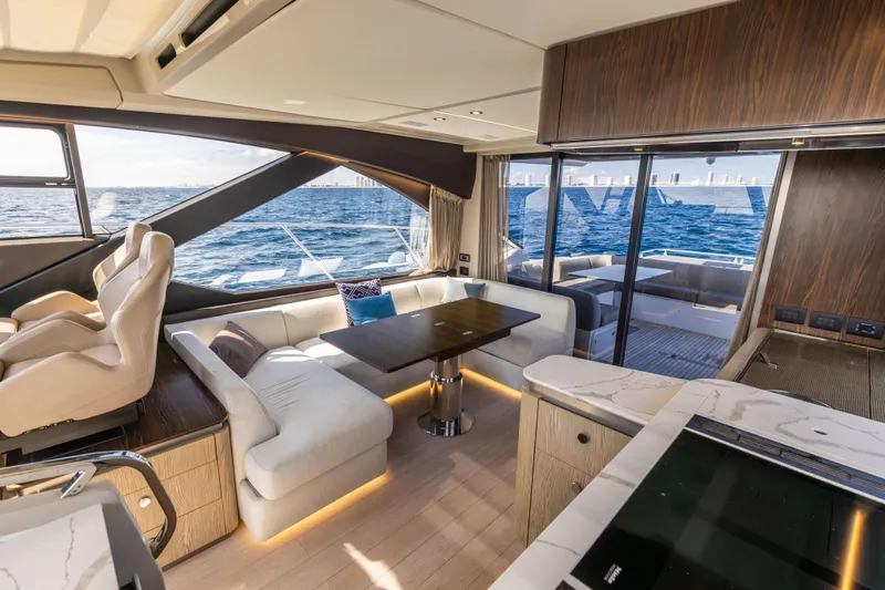 Slide: The Image of Luxurious interior of 2021 Azimut S6 Sportfly yacht with modern helm and ocean view. - 117