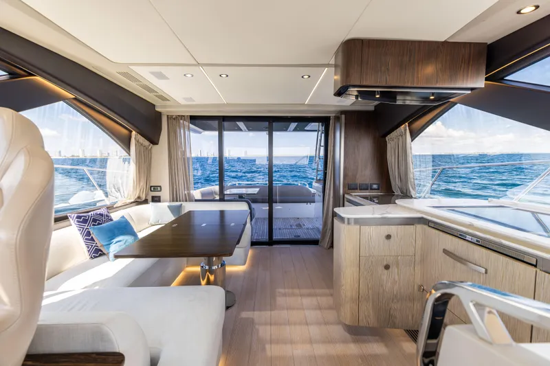 Slide: The Image of Luxurious interior of 2021 Azimut S6 Sportfly yacht with leather seating and ocean view. - 127