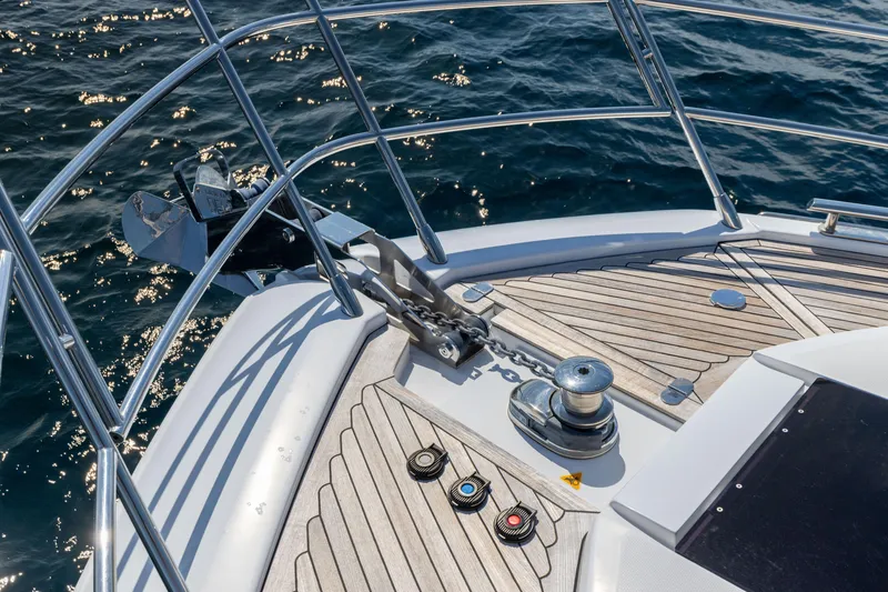 Slide: The Image of Azimut S6 Sportfly 2021 yacht cruising on open sea under clear blue sky. - 130