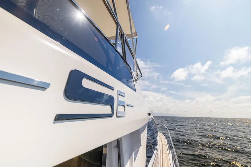 Slide: The Image of Luxurious 2021 Azimut S6 Sportfly yacht deck with ocean view and modern seating. - 136