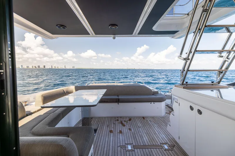 Slide: The Image of Luxury Azimut S6 Sportfly 2021 yacht deck with ocean view and modern seating. - 137