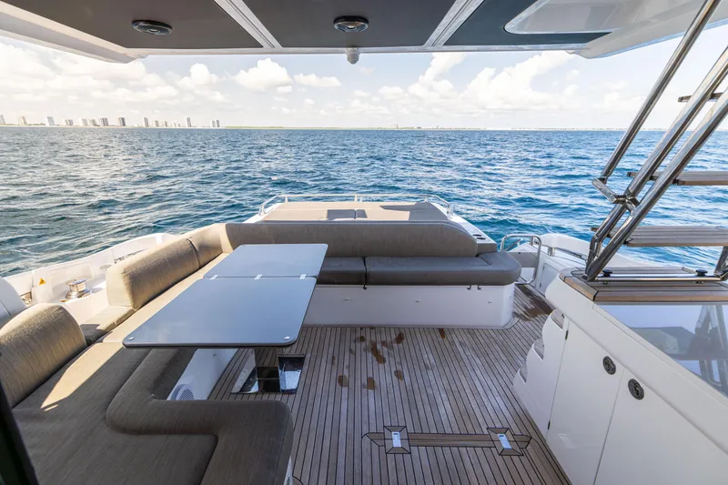 Slide: The Image of Luxurious 2021 Azimut S6 Sportfly yacht with elegant seating and ocean view. - 138