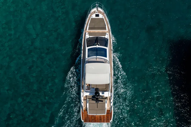 Slide: The Image of Aerial view of 2021 Azimut S6 Sportfly yacht cruising in clear blue waters. - 14