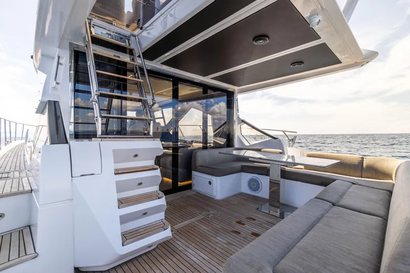 Slide: The Image of Luxurious 2021 Azimut S6 Sportfly yacht deck with ocean view and comfortable seating. - 142