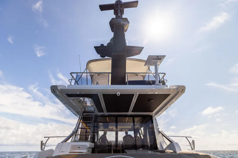 Slide: The Image of 2021 Azimut S6 Sportfly yacht on open sea with luxurious deck and seating. - 144