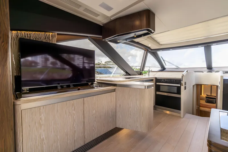 Slide: The Image of Cockpit of 2021 Azimut S6 Sportfly yacht with advanced navigation displays and controls. - 165