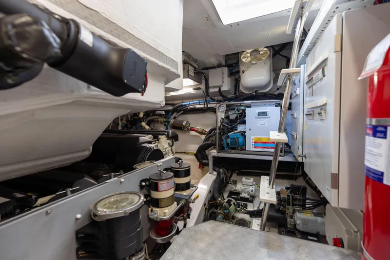 Slide: The Image of Engine room of 2021 Azimut S6 Sportfly yacht with equipment and fire extinguisher. - 178