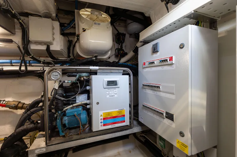 Slide: The Image of Engine room of 2021 Azimut S6 Sportfly yacht with Kohler generator and mechanical components. - 181