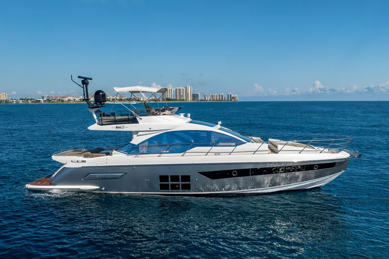 Slide: The Image of Azimut S6 Sportfly 2021 luxury yacht cruising on open sea. - 19
